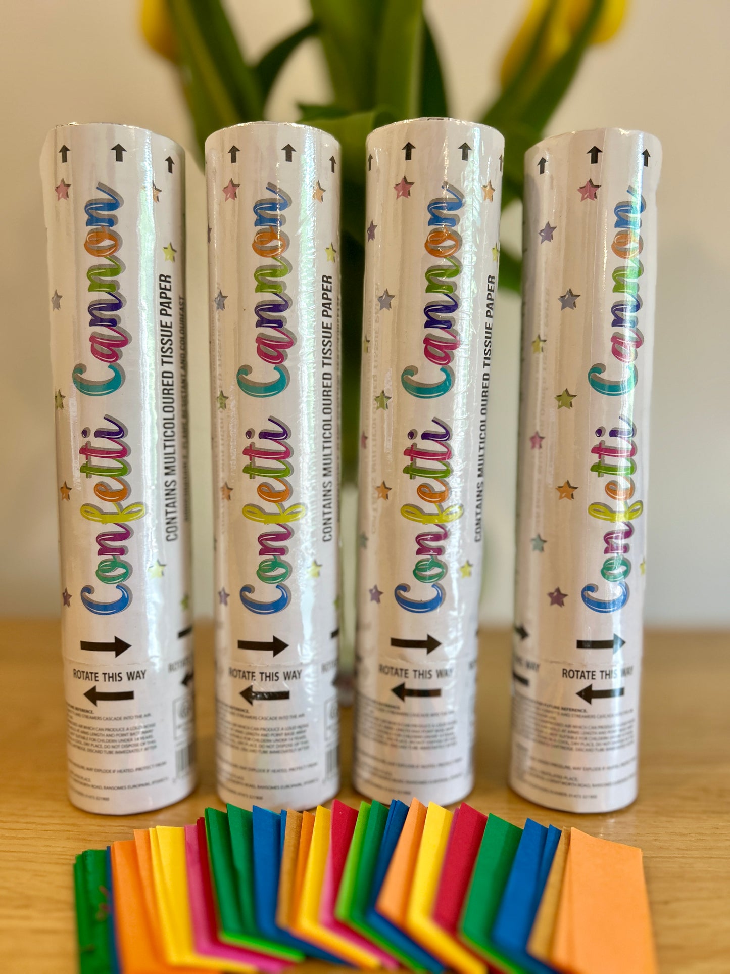 Multicolour confetti cannons with biodegradable confetti shown.