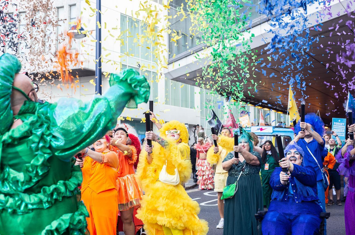 Rainbow confetti cannons at Pride event