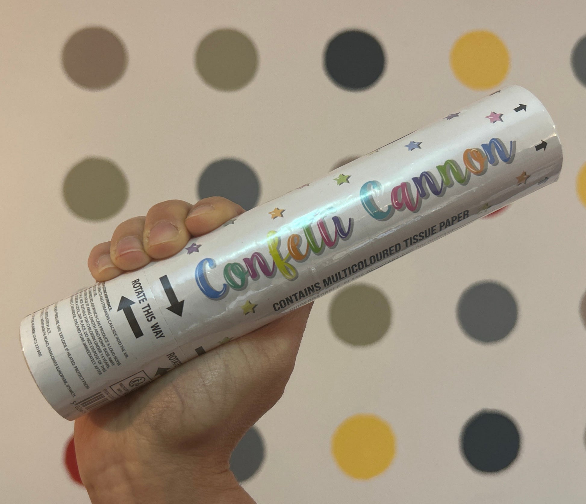 20cm Multicolour confetti cannon held in hand.