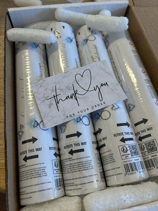 Four 20cm white confetti cannons in a box with a thank you card.  