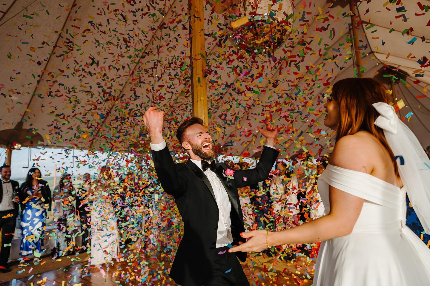 Multi colour confetti cannon at party