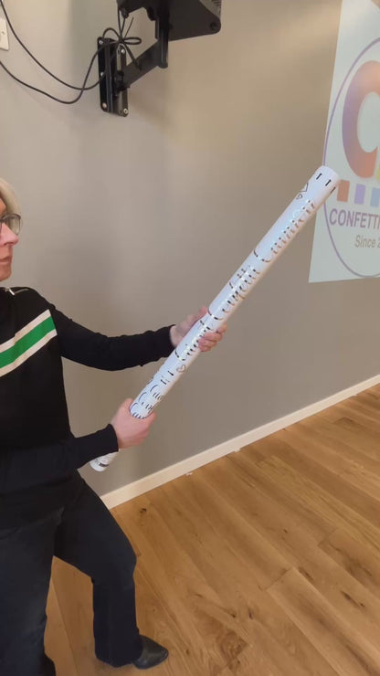 3 white confetti cannons being demonstrated to compare sizes. The video show payload of confetti and distance reached.